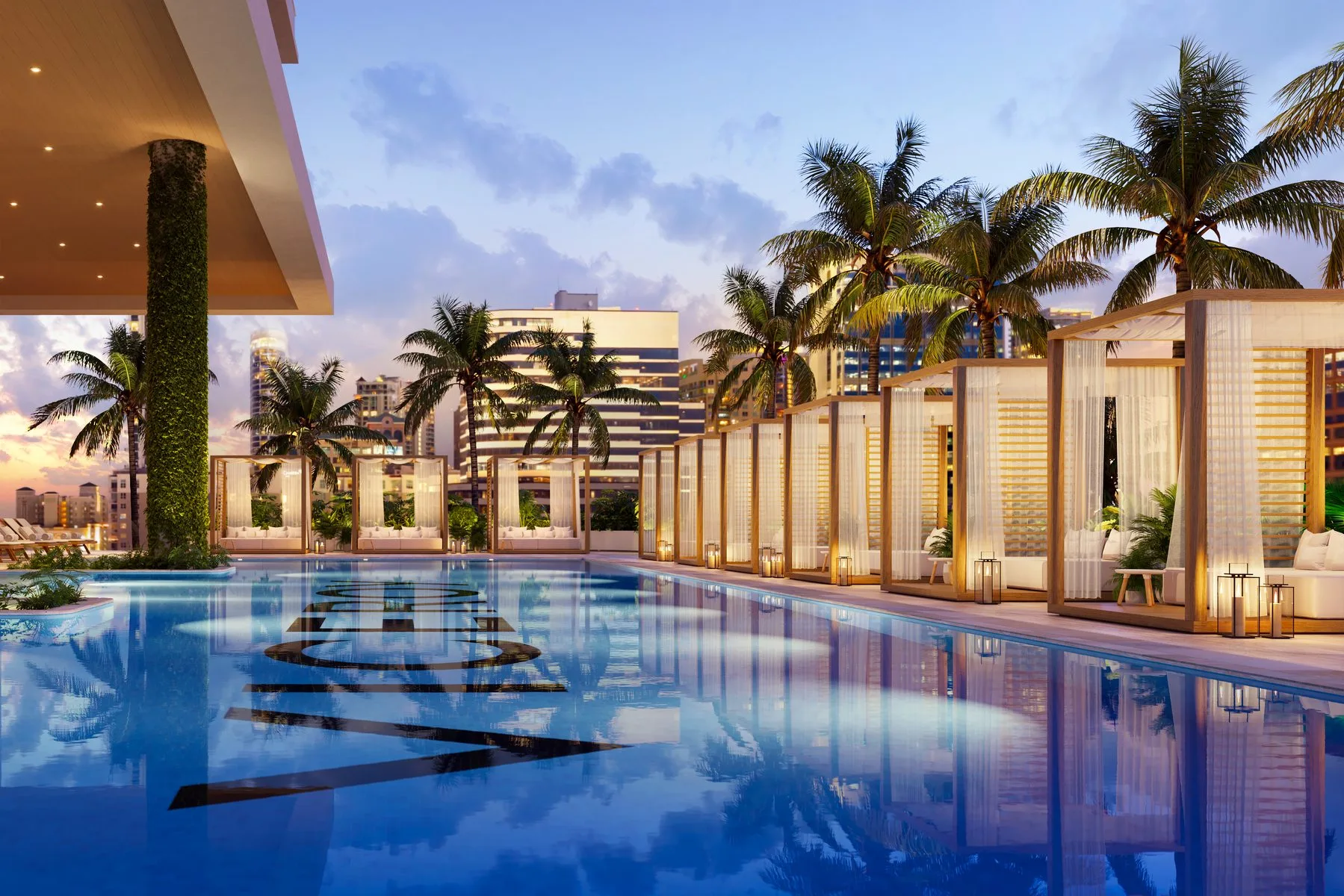 Viceroy Residences — 10th Floor Pool at dusk with ivy-wrapped pillars and illuminated cabanas
